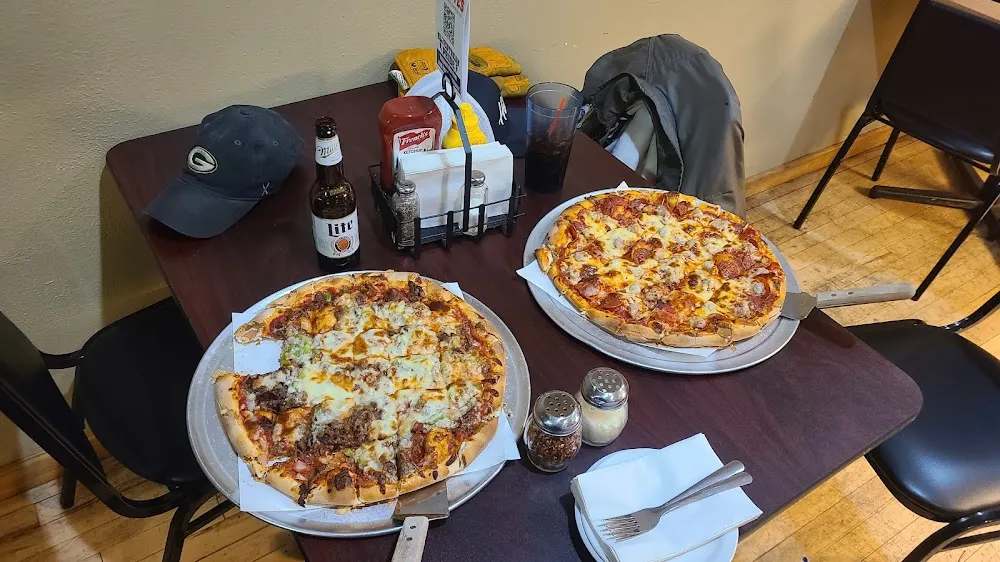 Pepper Steak Pizza and Sausage and Pepperoni Pizza